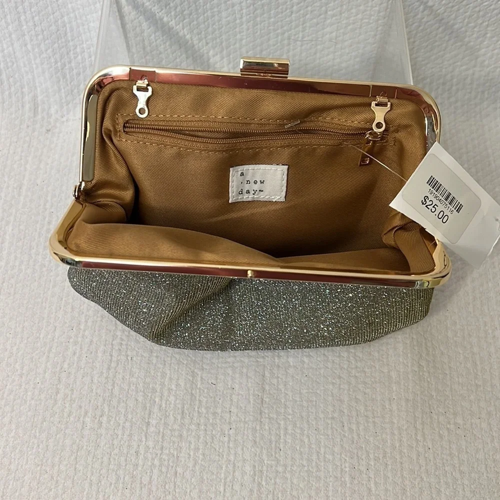 A new day -‎ gold metal frame clutch with sparkle fabric